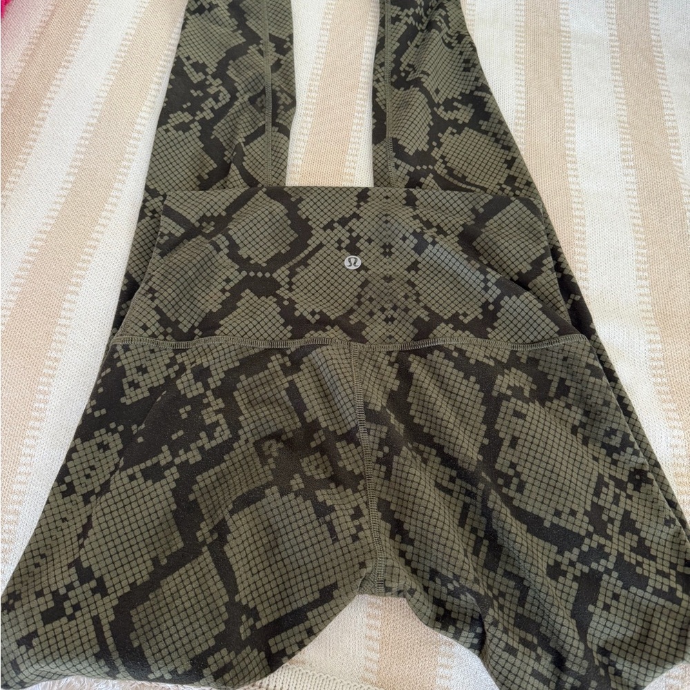 lululemon athletica Dark Green Snake Pattern leggings.